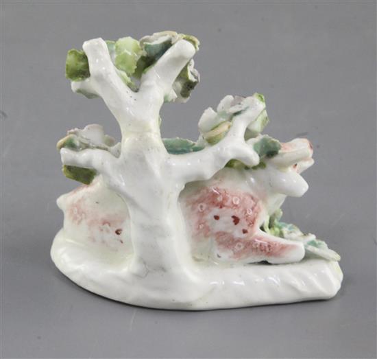 A Derby figure of a lowing cow, c.1765-70, l. 7.6cm, bocage and horns restored
